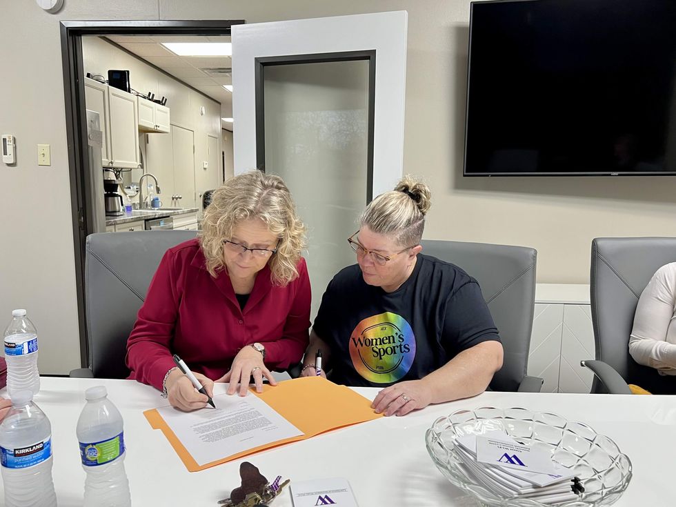 1972 ATX Women's Sports Pub patio founders Debra Hallum and Marlene du Plessis