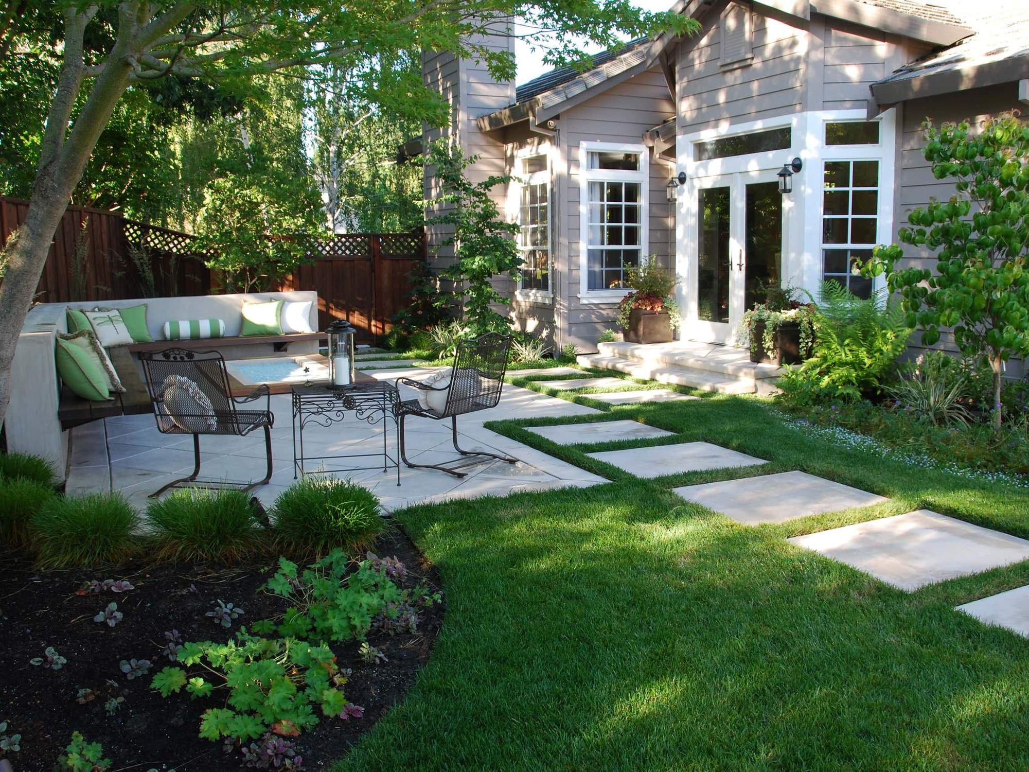 Austinites love a cozy backyard where the green grass grows. Photo courtesy of J. Montgomery Designs, Inc.