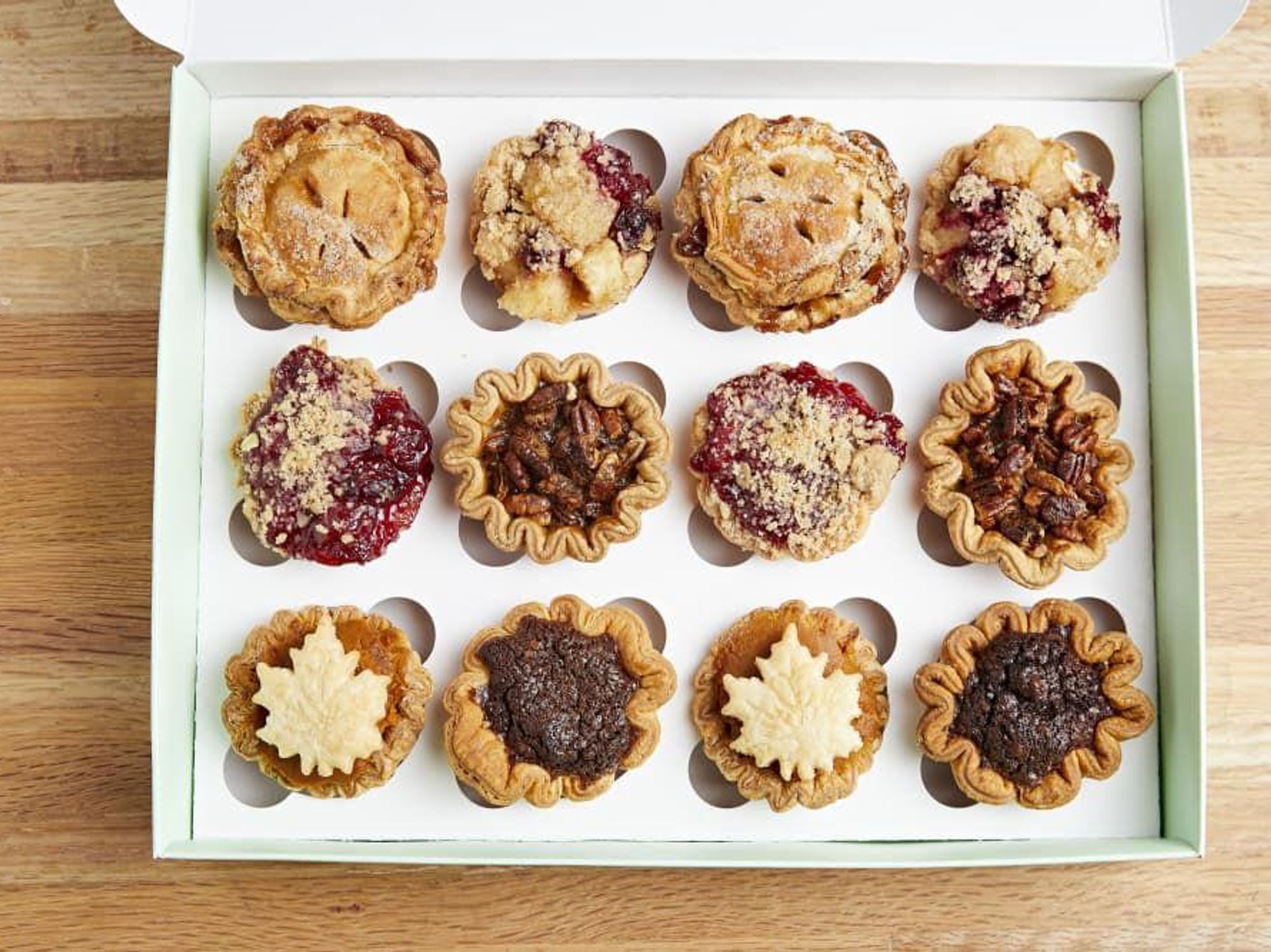 A 12 pack of pies in 6 flavors from Tiny Pies.