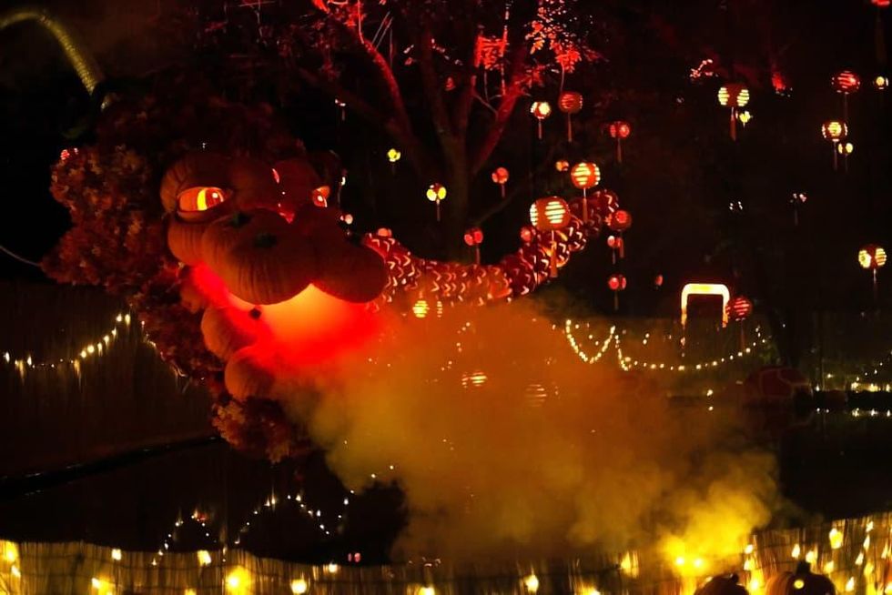 A 40-foot string of jack-o-lanterns creates the image of a flying dragon.