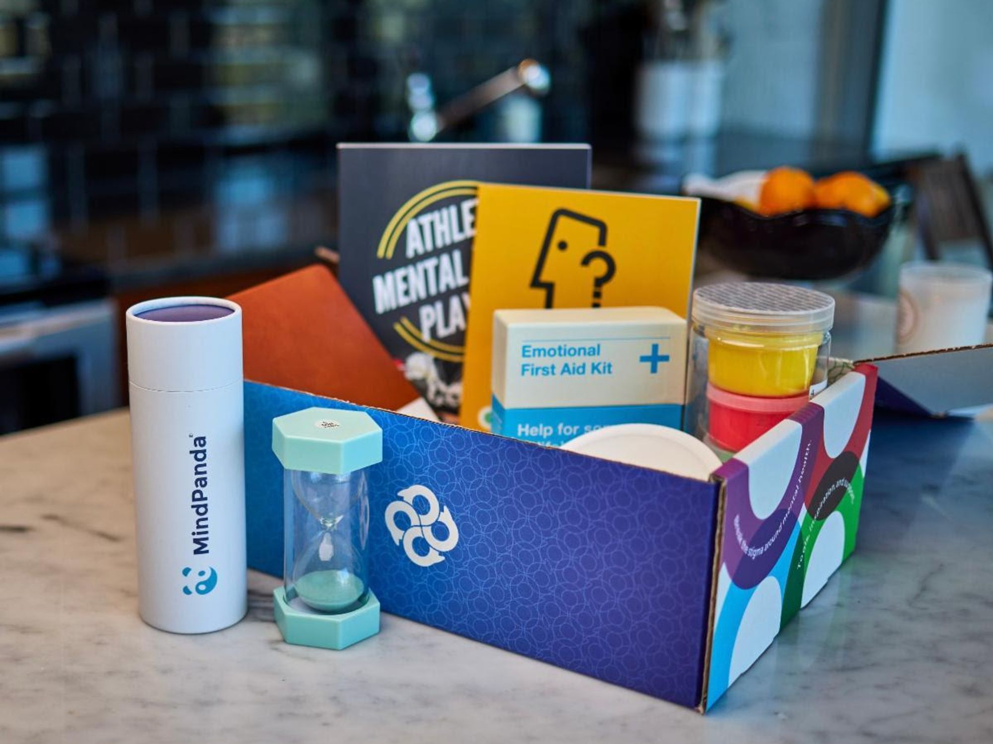 A box of mental health items from Speak As One in Austin.