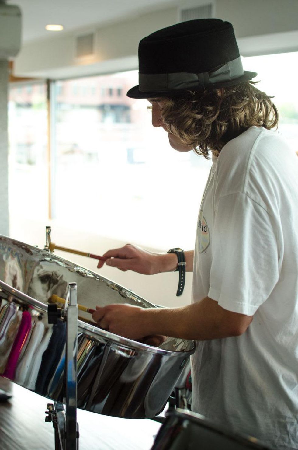 A member from the steel drum band