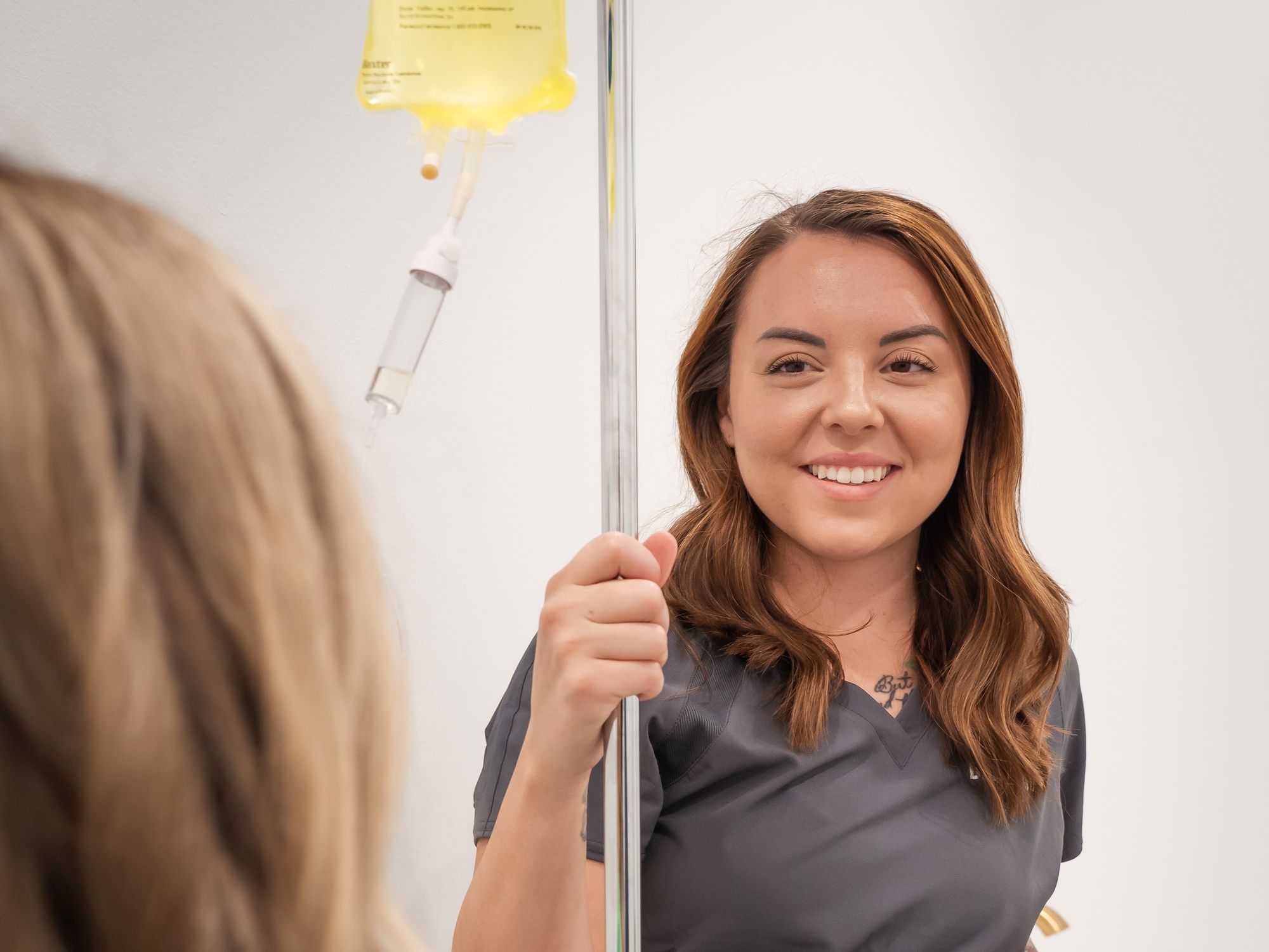 A staff member at DRIPBaR