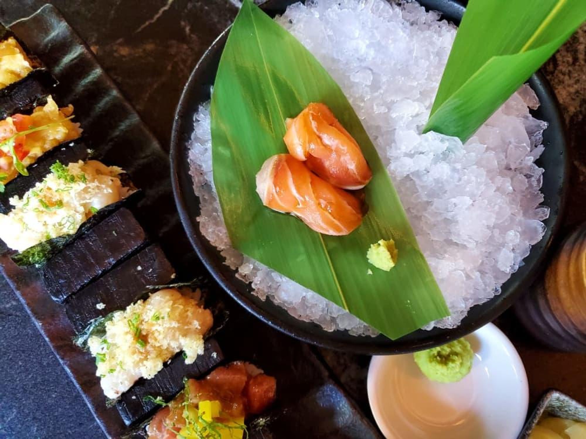 A sushi and hand roll spread at TenTen.