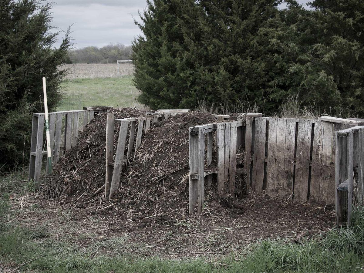 Compost bin built from recycled pallets has three bays. CultureMap Austin