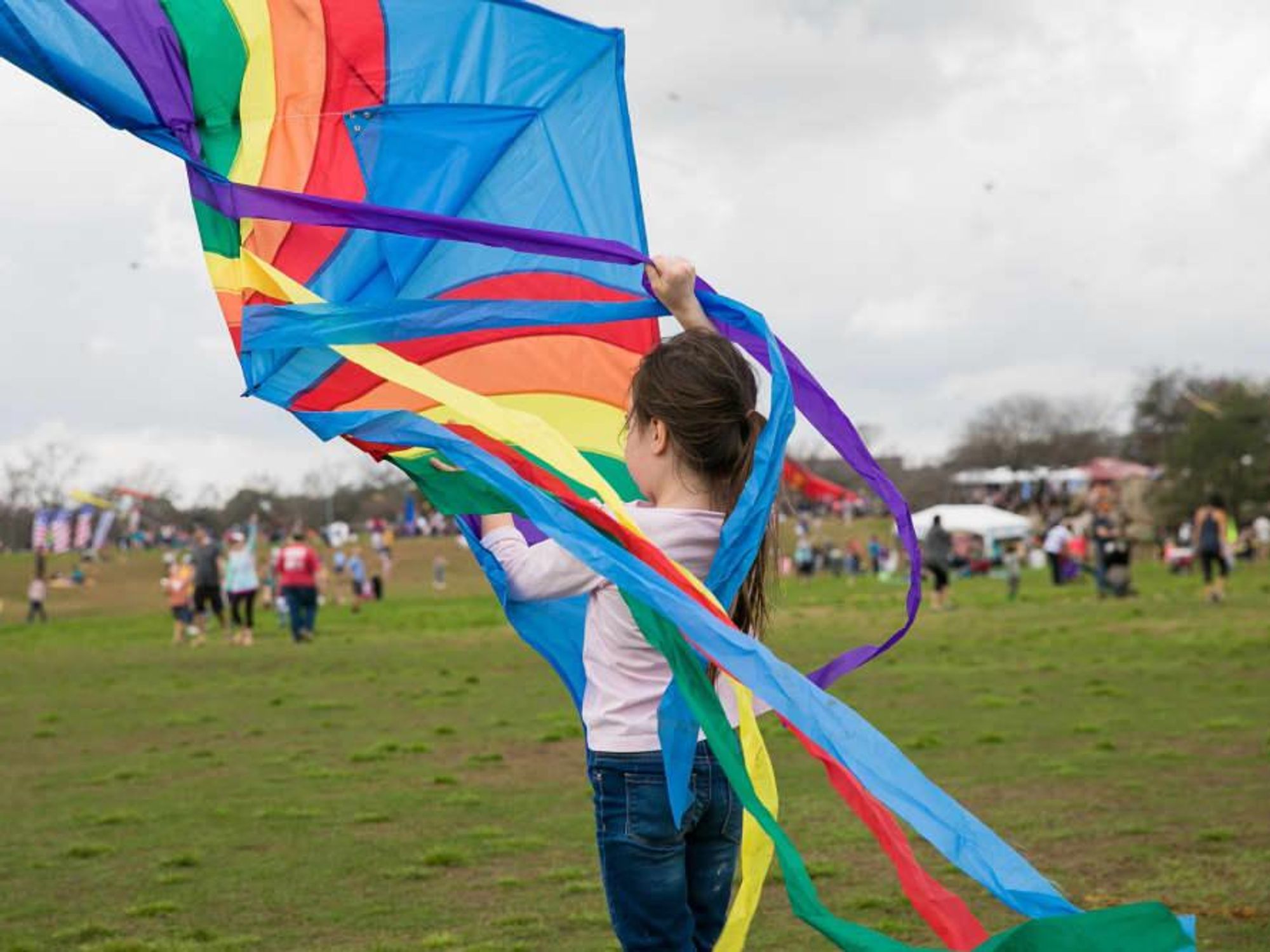 ABC Kite Festival girl with kite zilker park