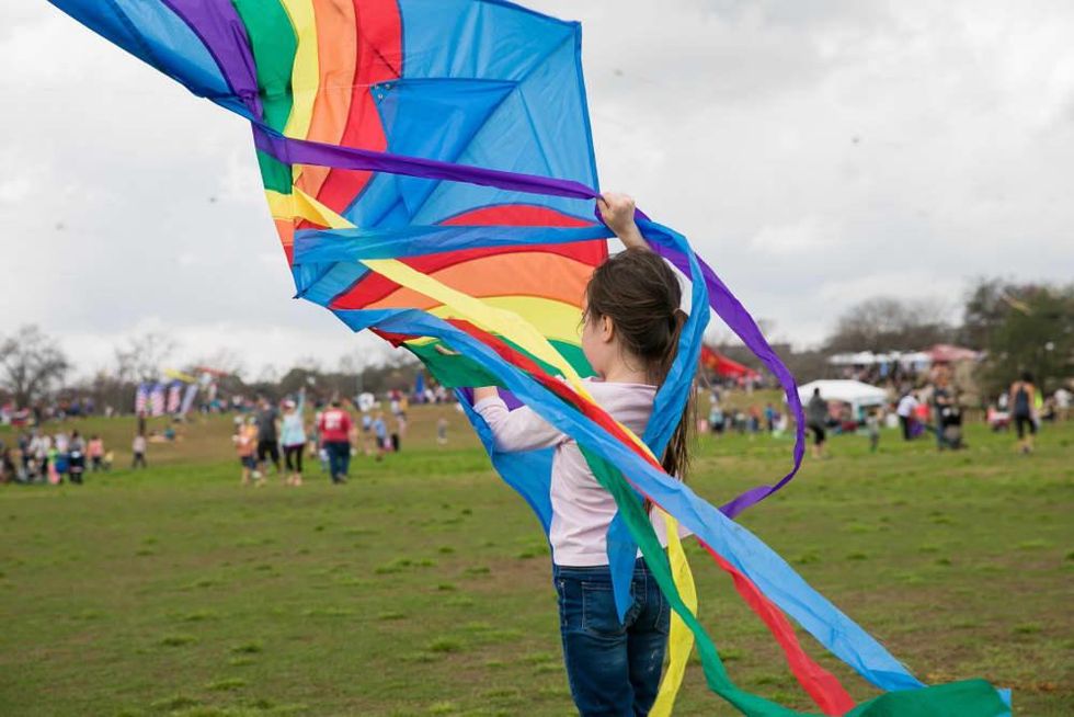 ABC Kite Festival girl with kite zilker park