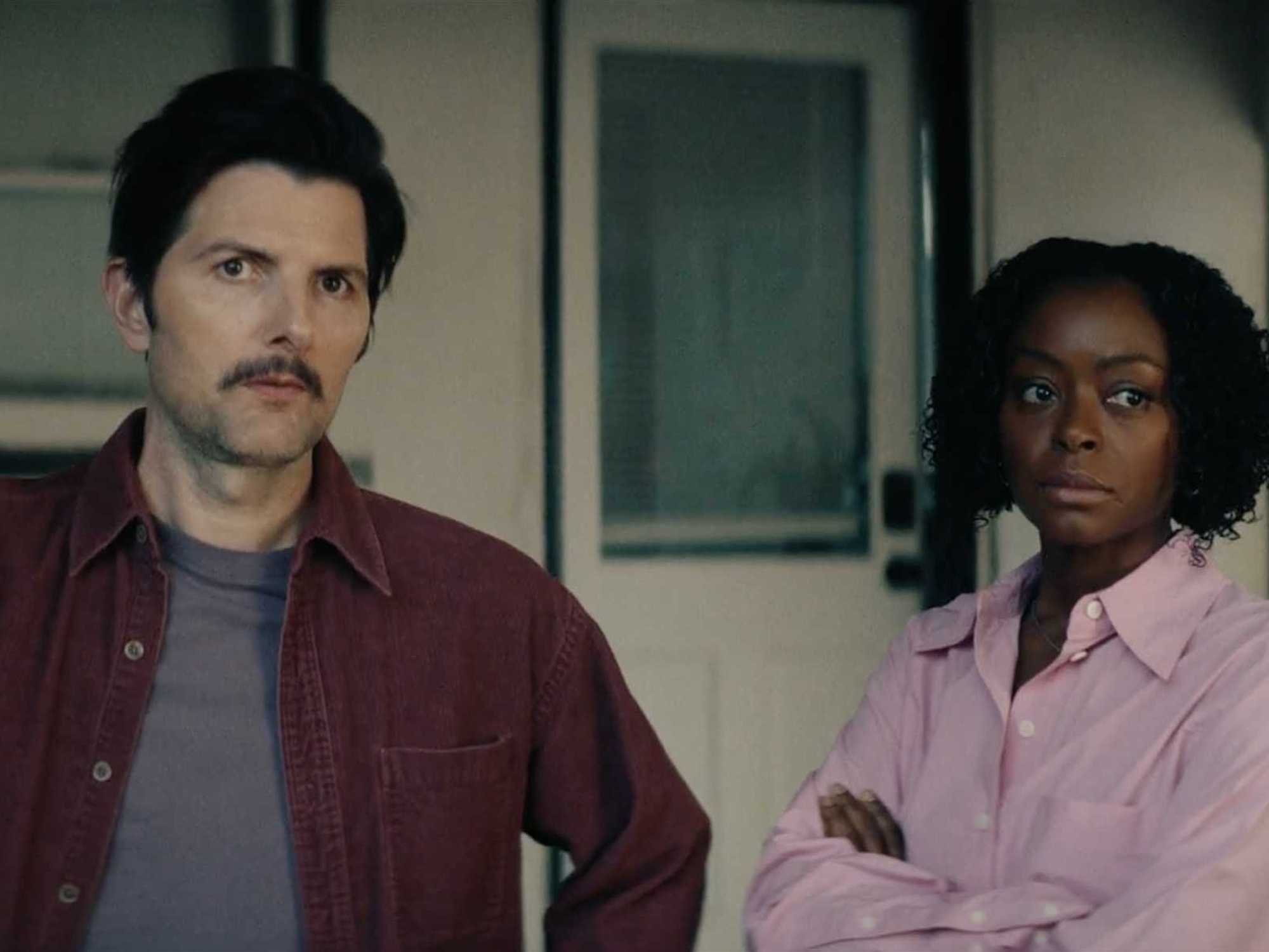 Adam Scott and Danielle Deadwyler in The Saviors
