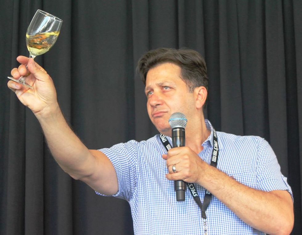 Anthony Giglio swirls wine in Underdog French