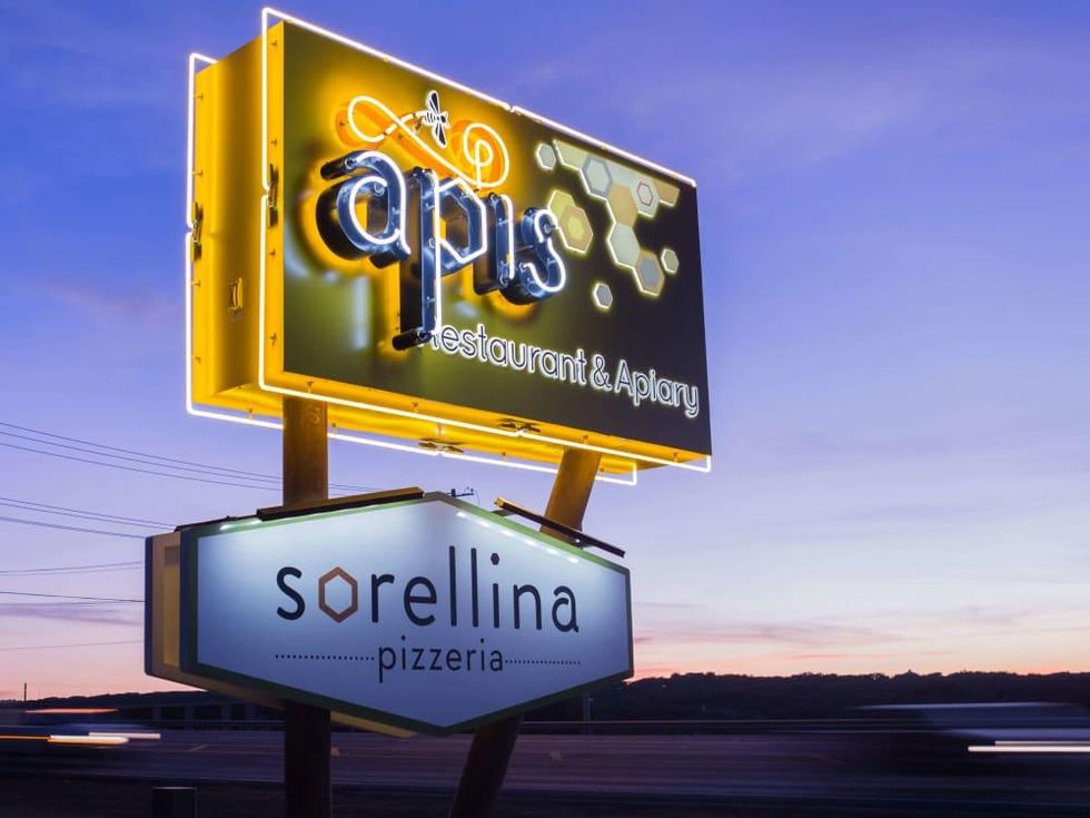 Apis Restaurant and Apiary Pizzeria Sorellina sign