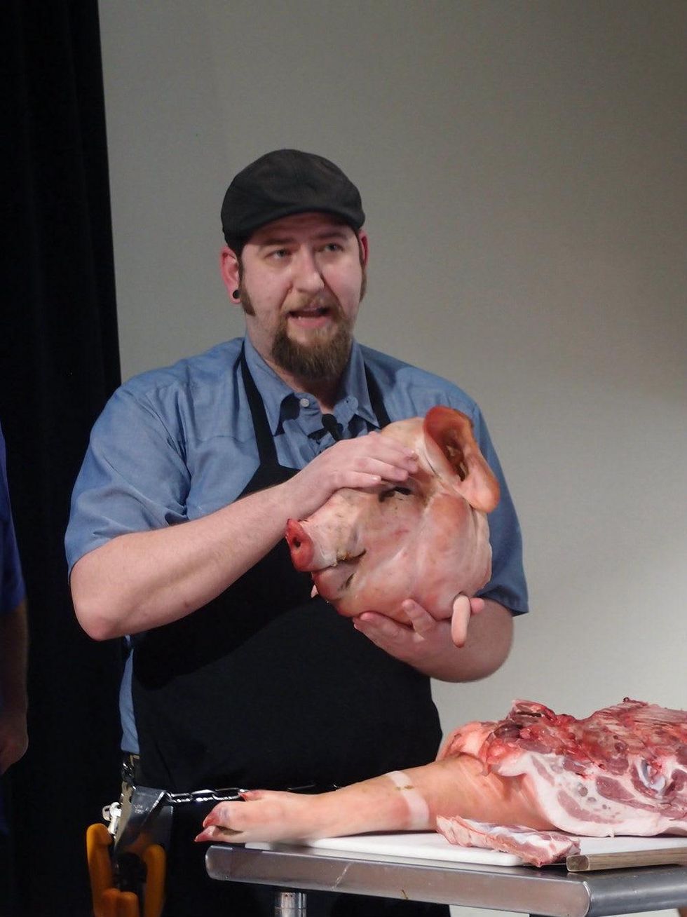 Auctioning the head at Slow Food Austin Grub Trivia