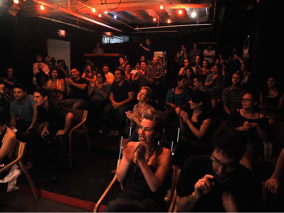 Audience at the New Movement Theater in Austin watching improv comedy