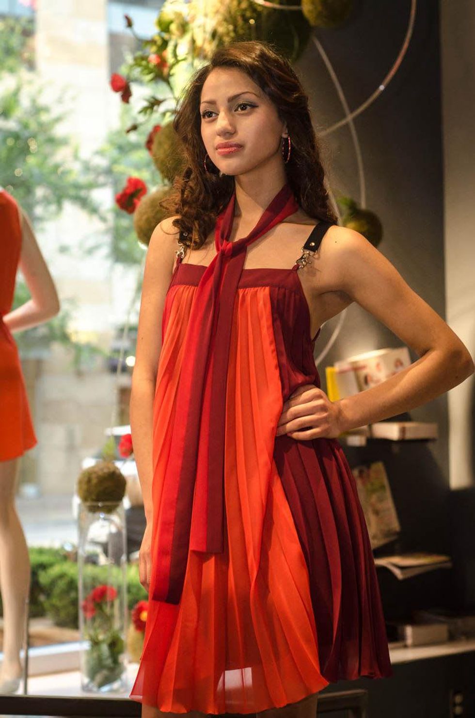 Austin Fashion Week kick off party at estilo 2013 Model Laura Cruz poses in a dress by Rare Trends