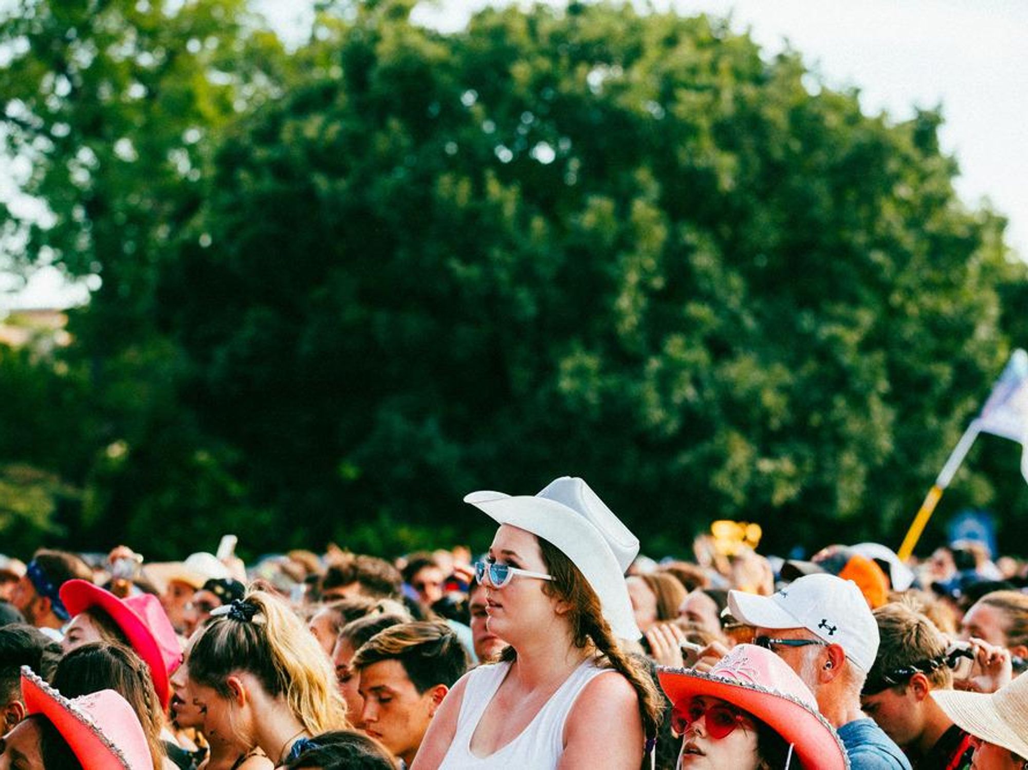 Austin festival goers in cowboy hats