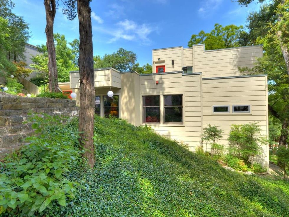Austin home house 5932 Highland Hills Dr 78731 exterior side hill