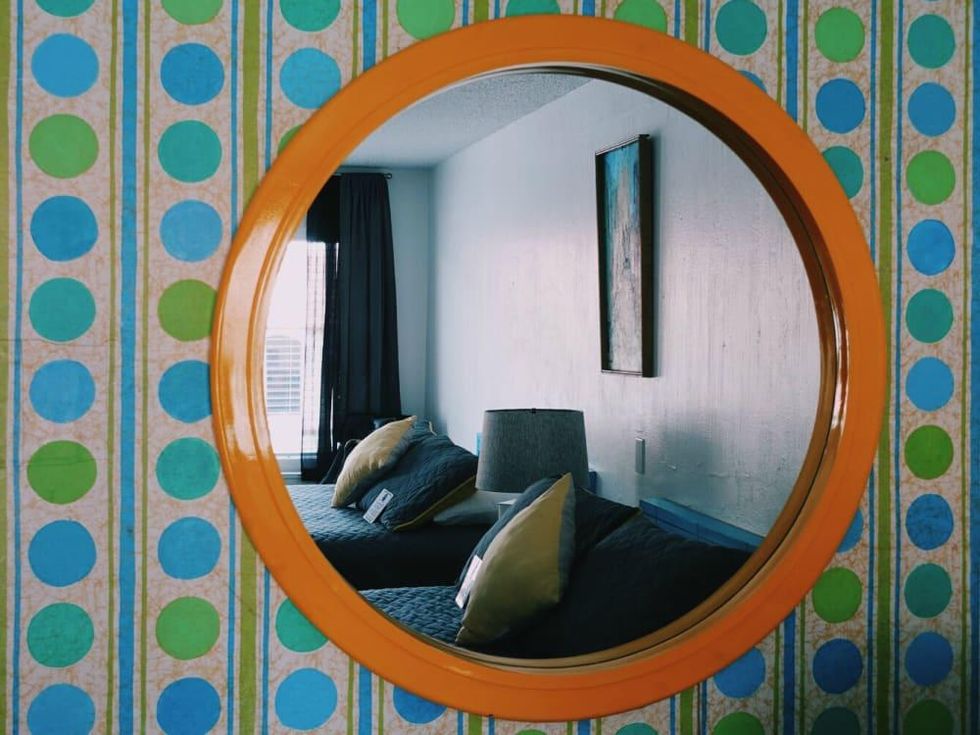 Austin Motel South Congress hotel Bunkhouse guest room mirror beds