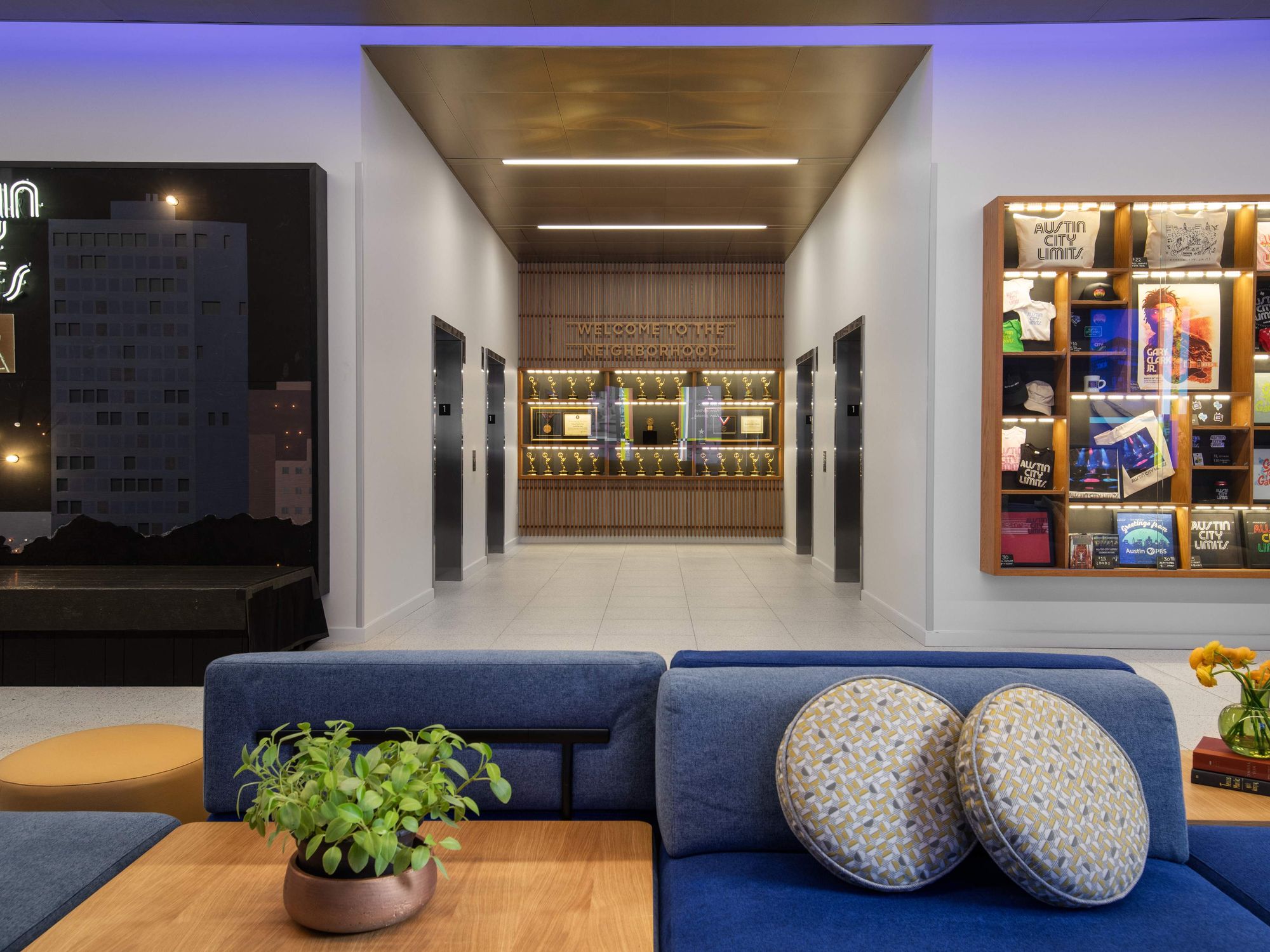 Austin PBS trophy wall lobby redesign