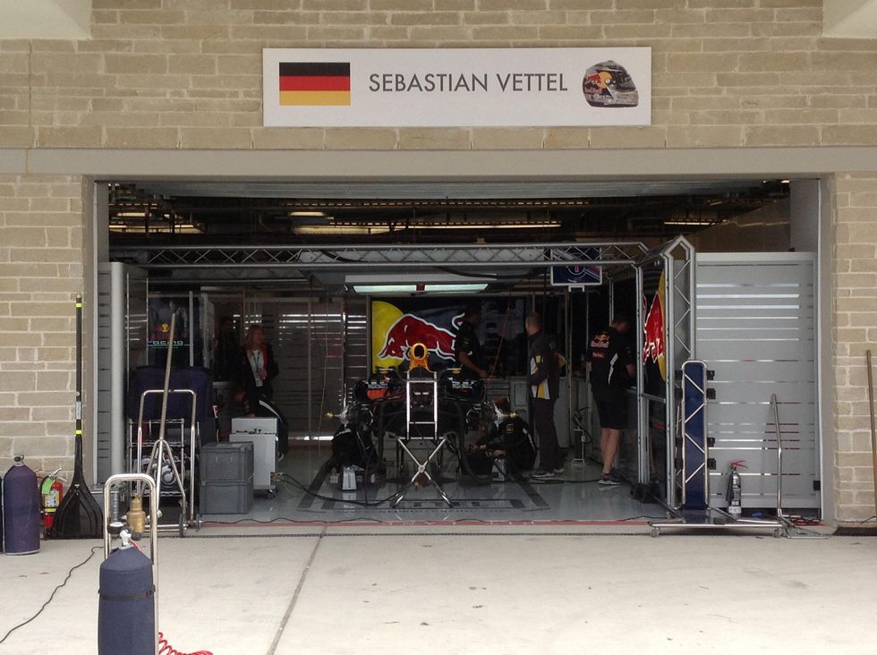 Austin Photo: Kevin_Marussia garage Formula 1_November 2012_vettel red bull pit