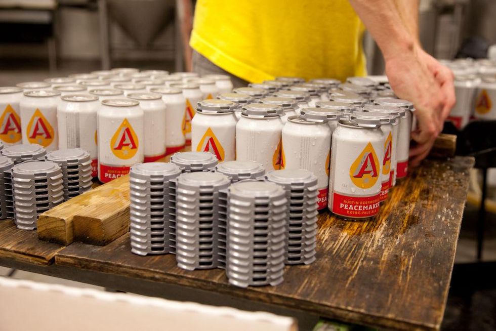 Austin Photo Set: News_Joelle_Austin Beerworks_feb 2012_canning_adding tops