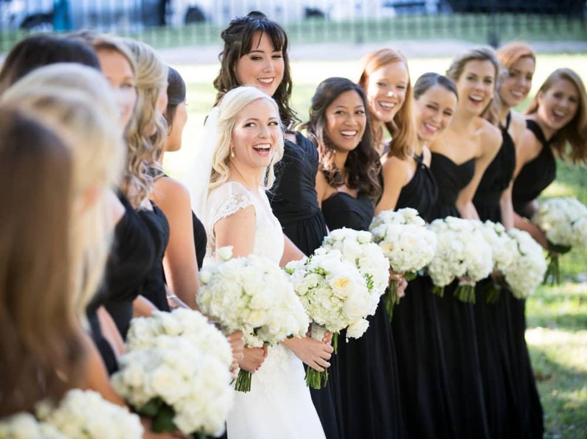The bridesmaids wore long chiffon black dresses. CultureMap Austin