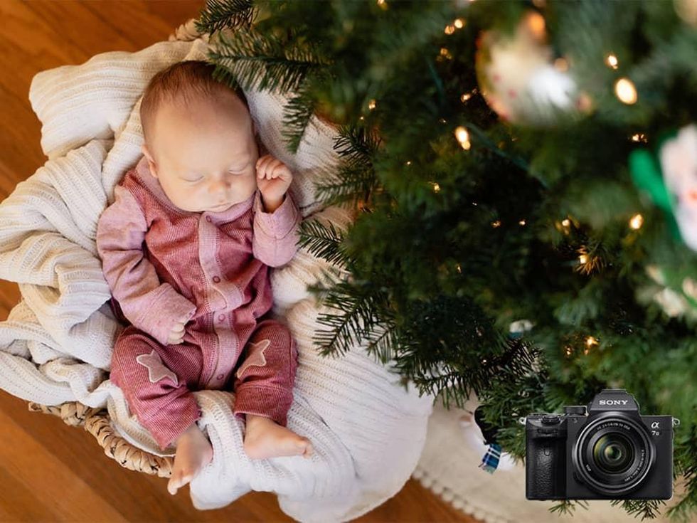 Baby under a Christmas tree