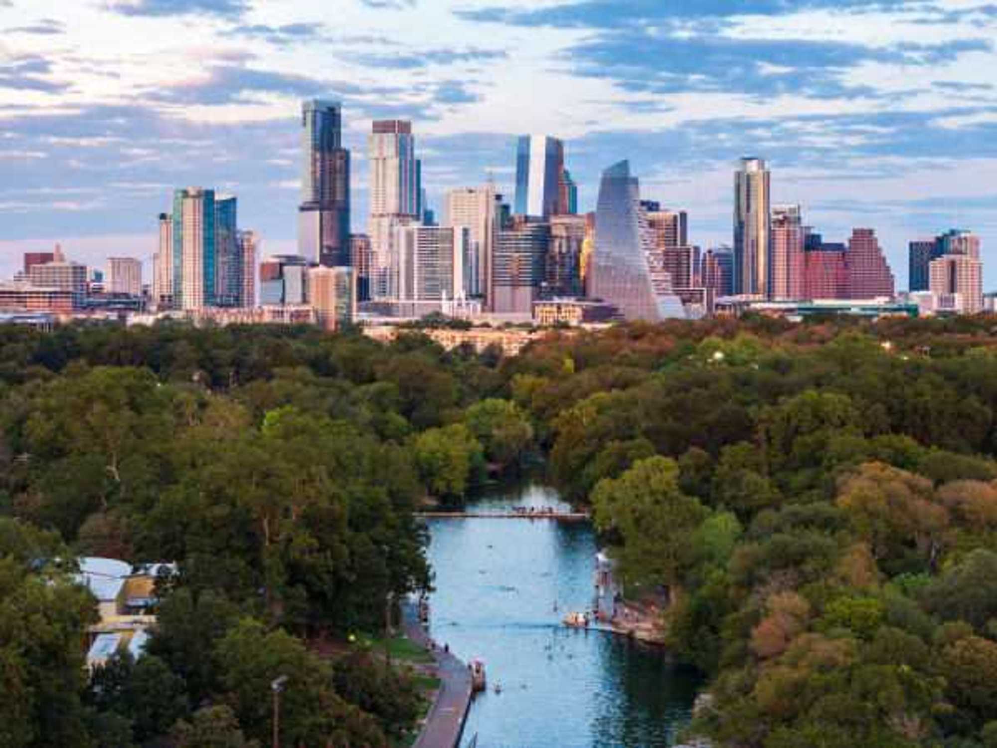 Barton Springs and Austin skyline