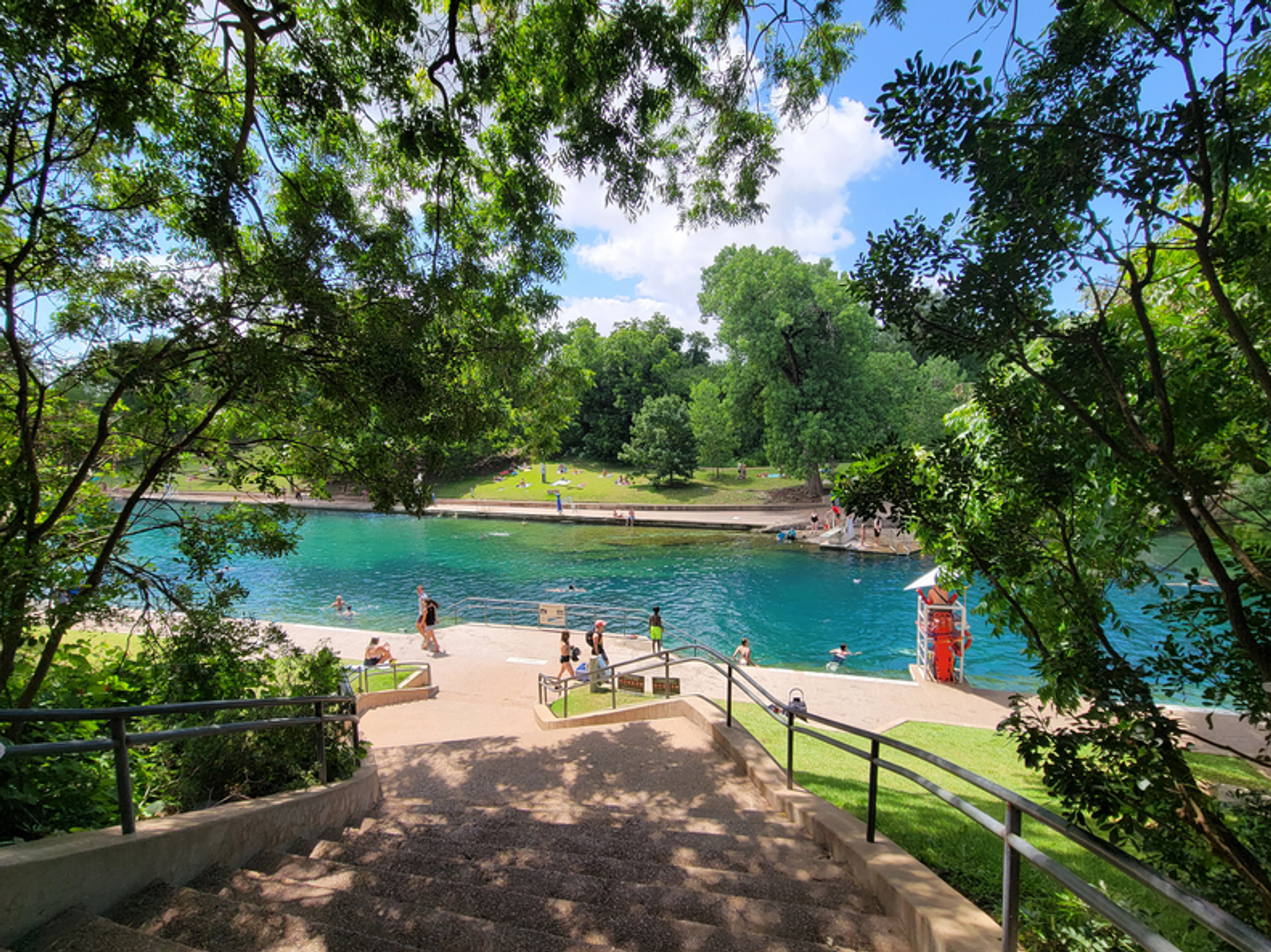Barton Springs Pool on a clear sunny day.