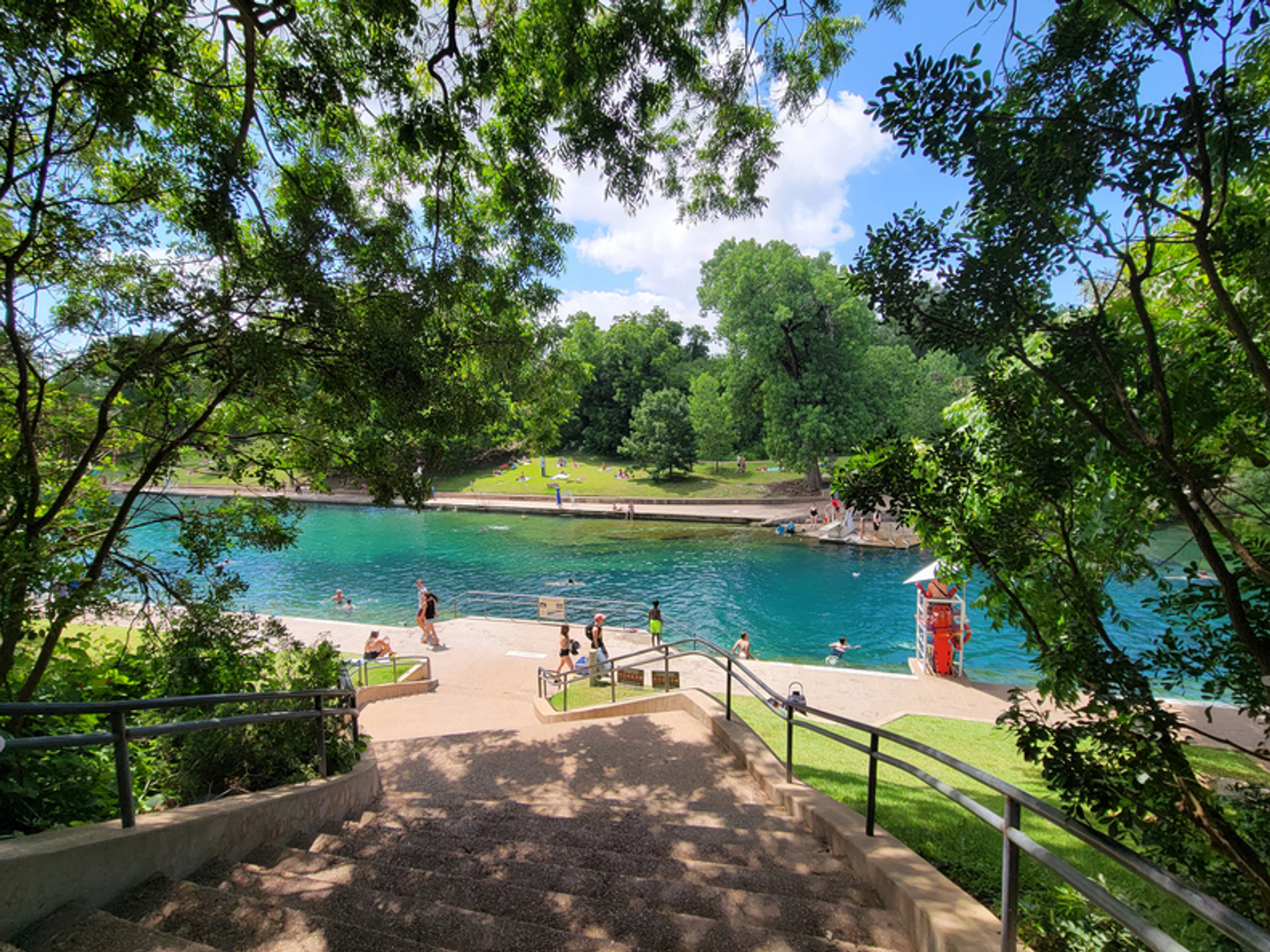 Barton Springs Pool on a clear sunny day.