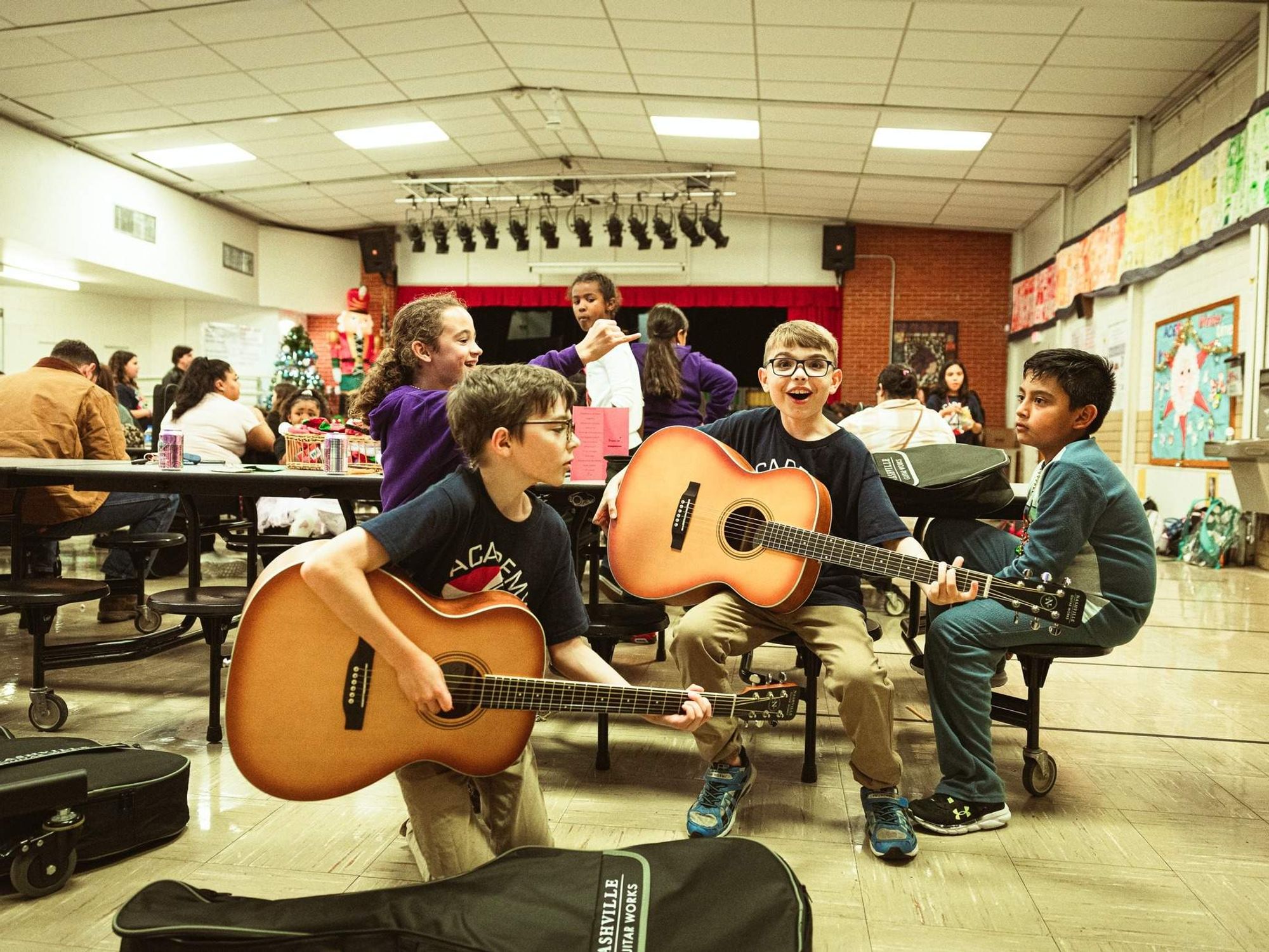 Beat 4 Beat students with guitars