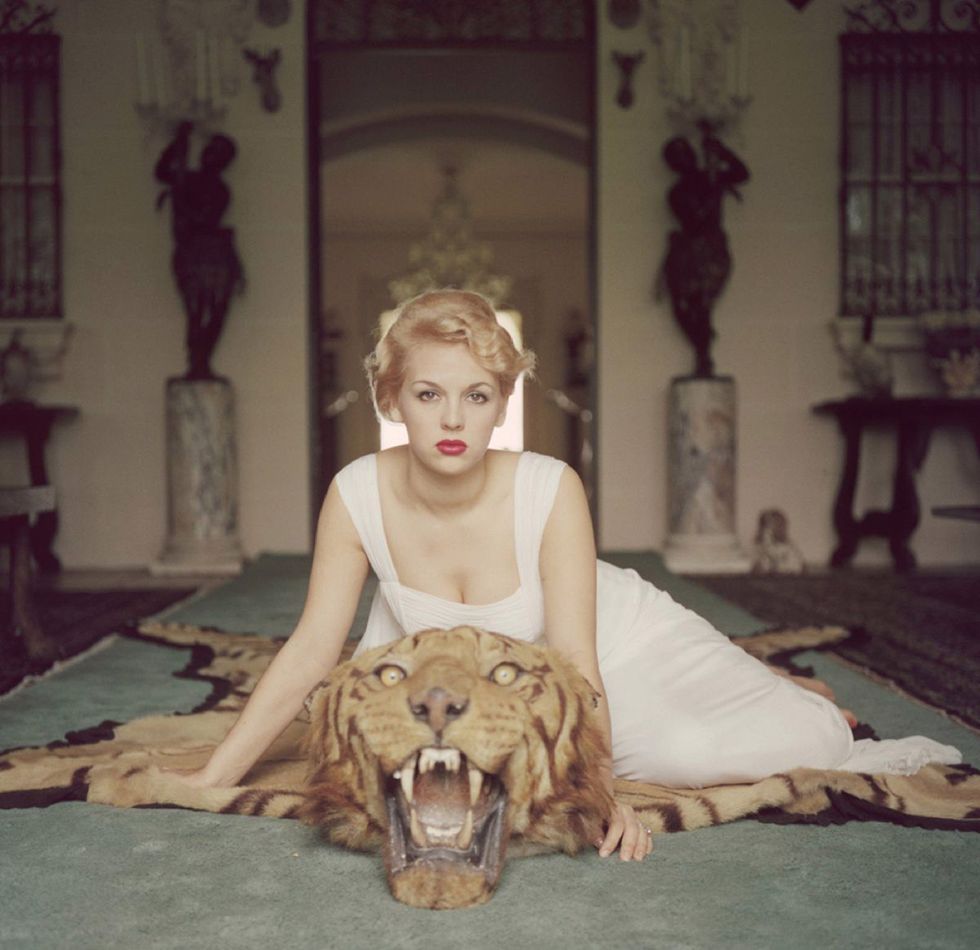 Beauty and the Beast, 1959 by Slim Aarons, estate stamped print.