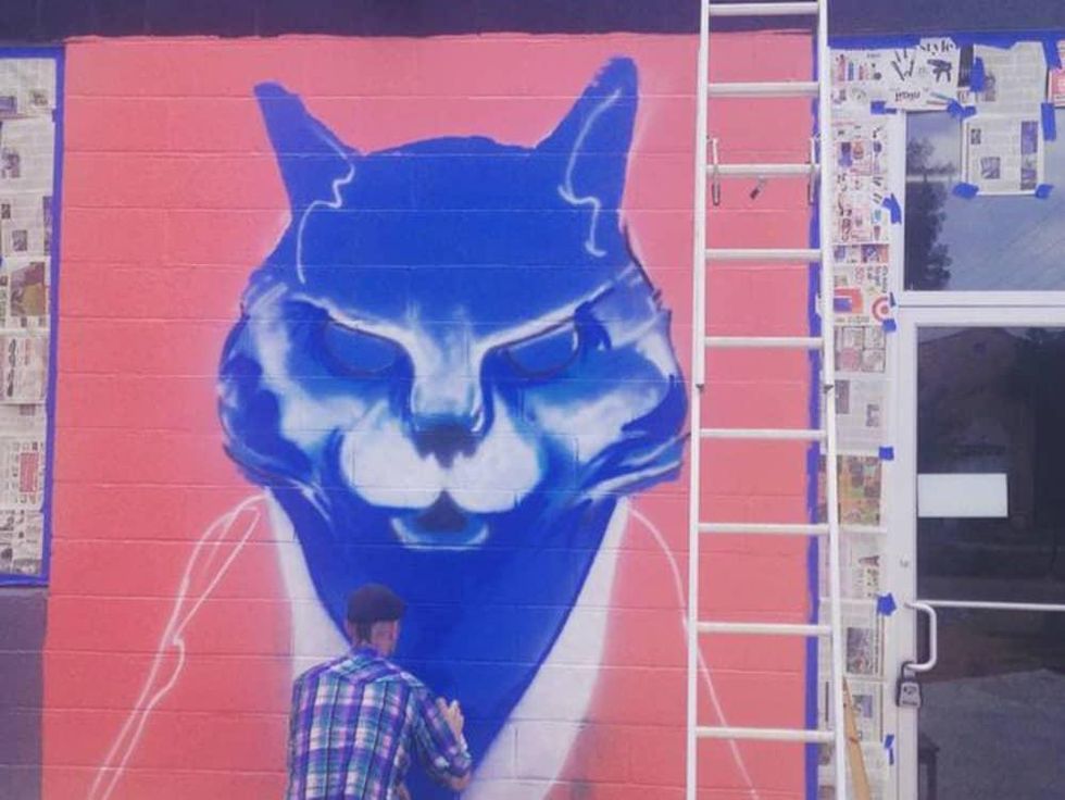 Blue Cat Cafe Austin exterior mural in process 2015