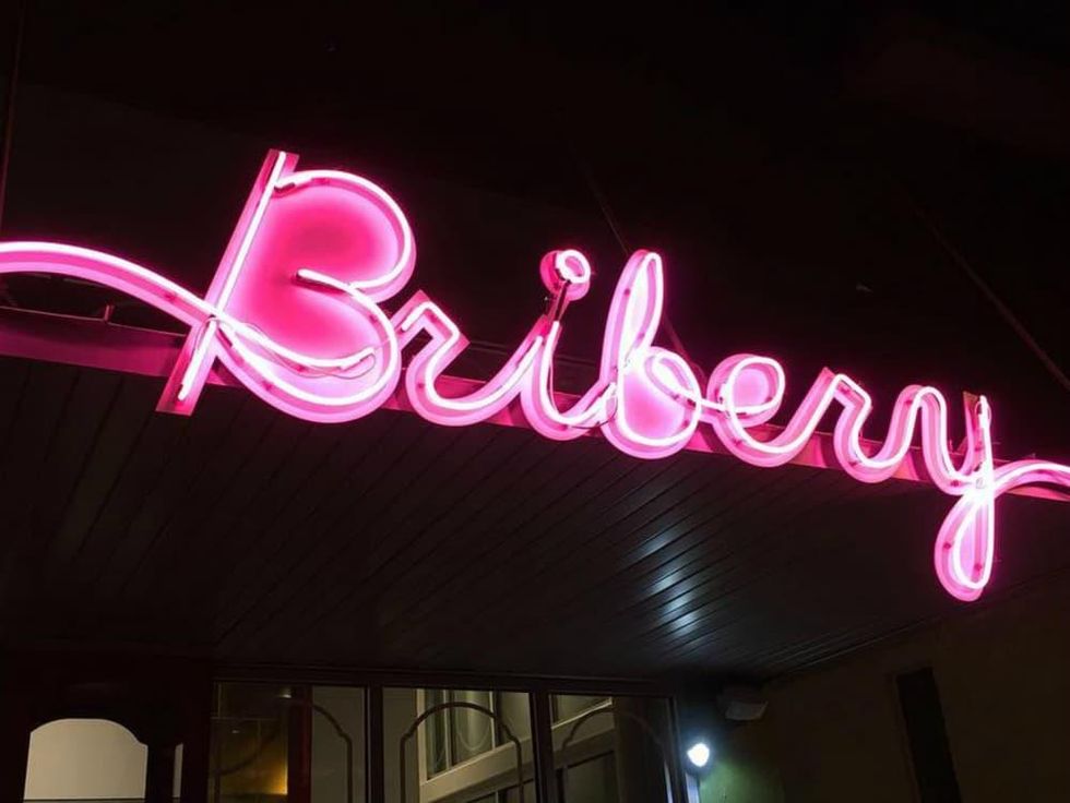 Bribery Bakery Mueller neon sign