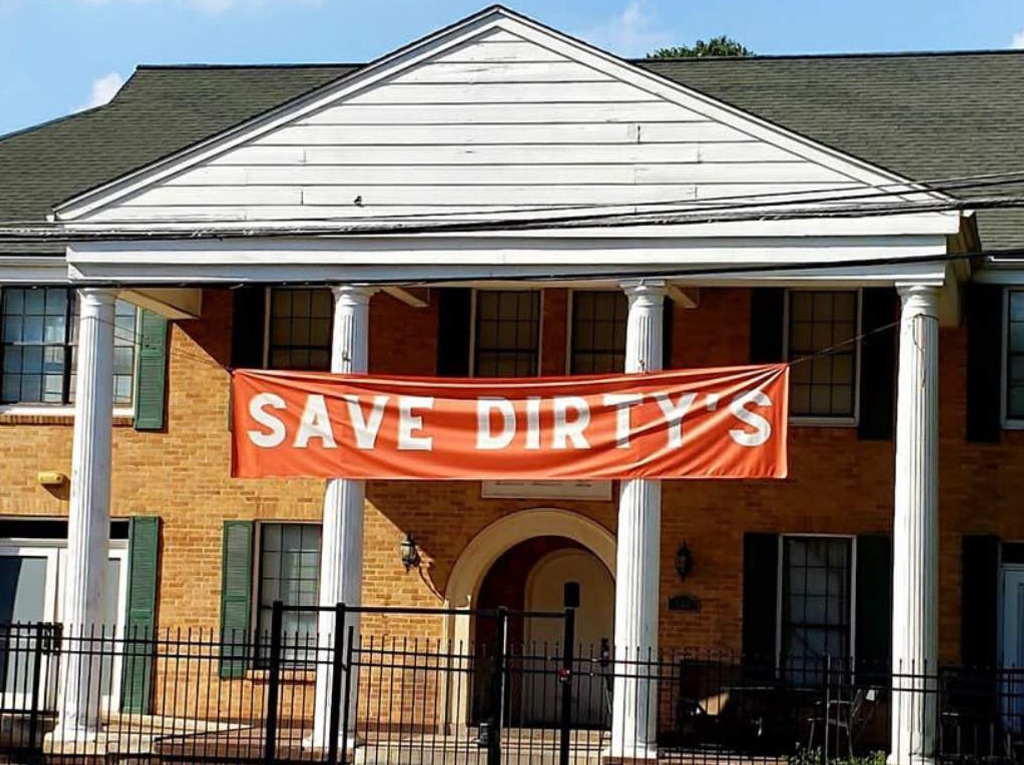 Building with Save Dirty's sign