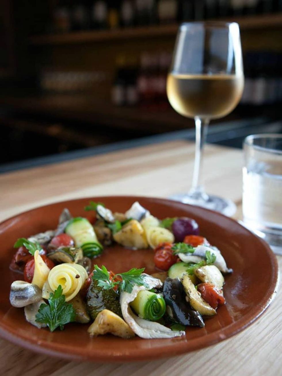 Bullfight Austin restaurant Spanish food plate dish wine glass