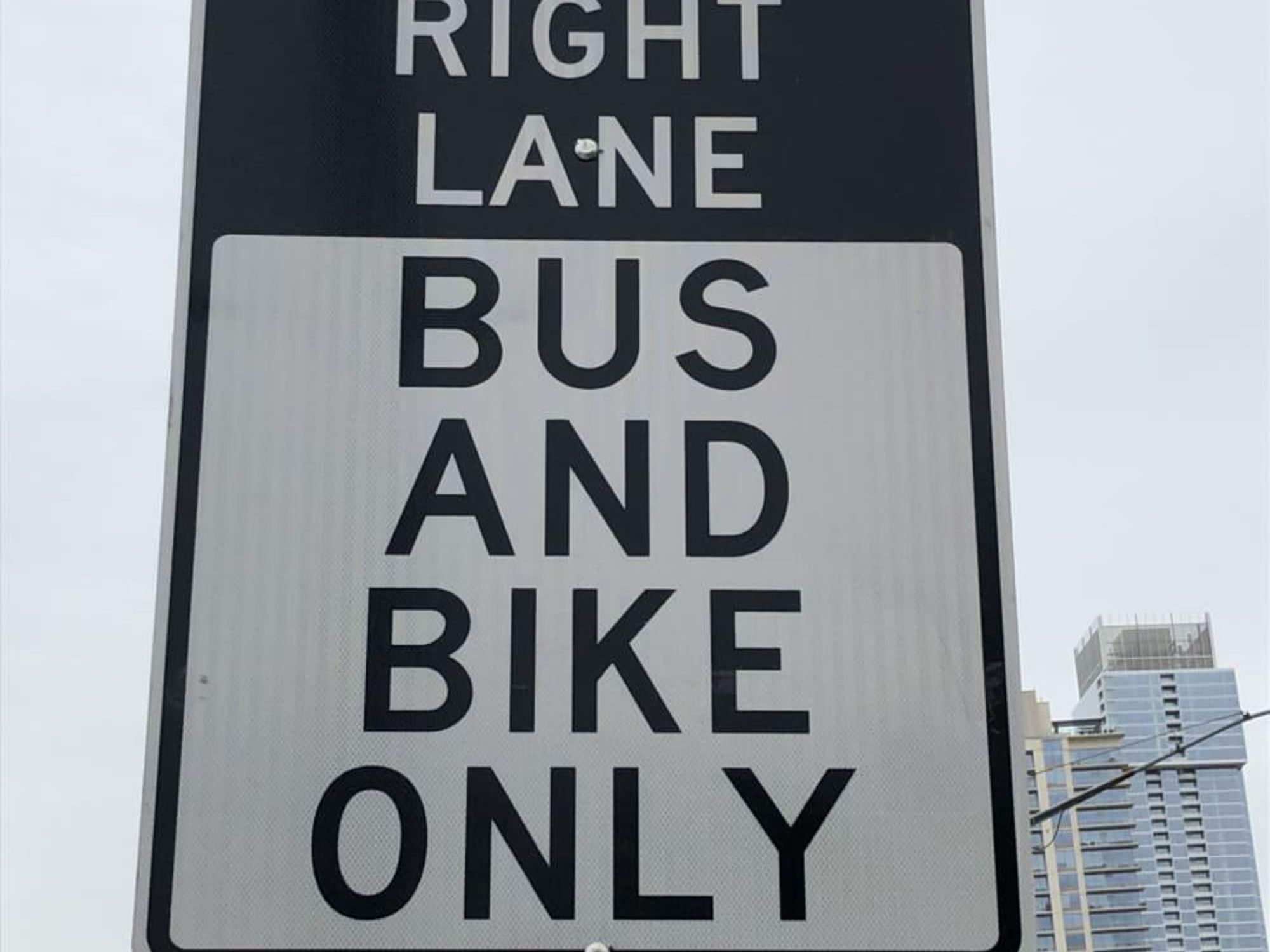 Bus bike lane sign