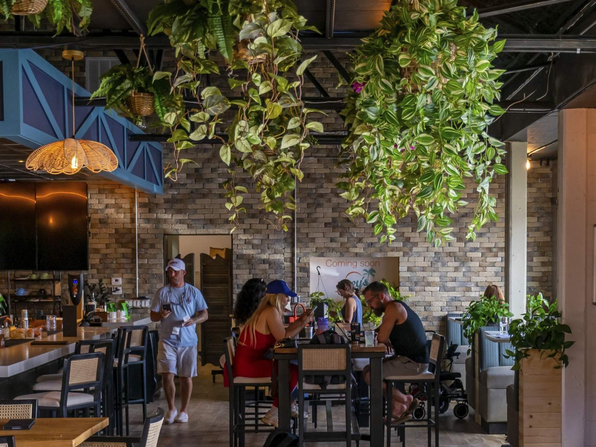 Cabana Club interior with people working remotely