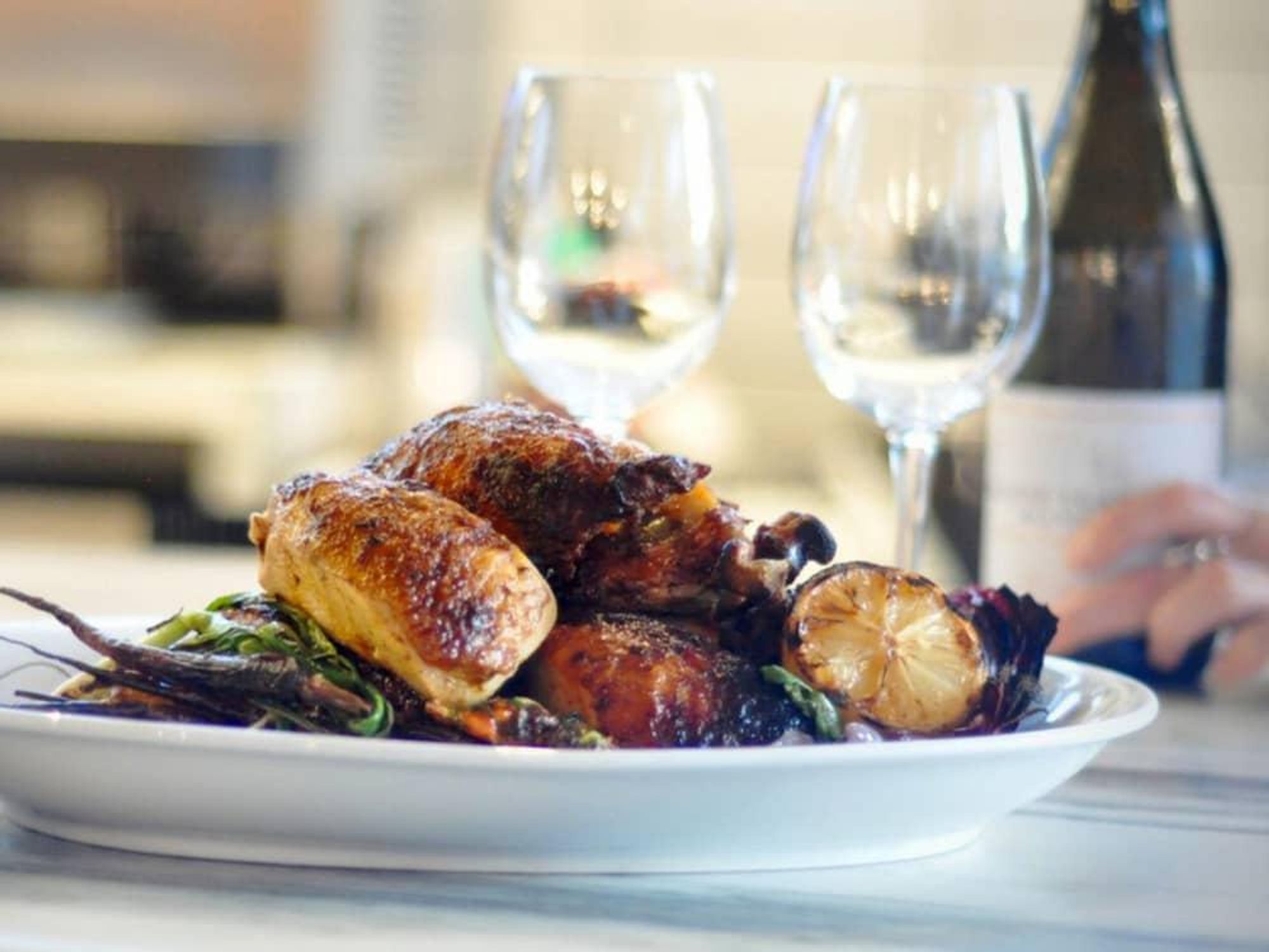 Cantine Italian Cafe and Bar Austin restaurant chicken for two dinner wine dish