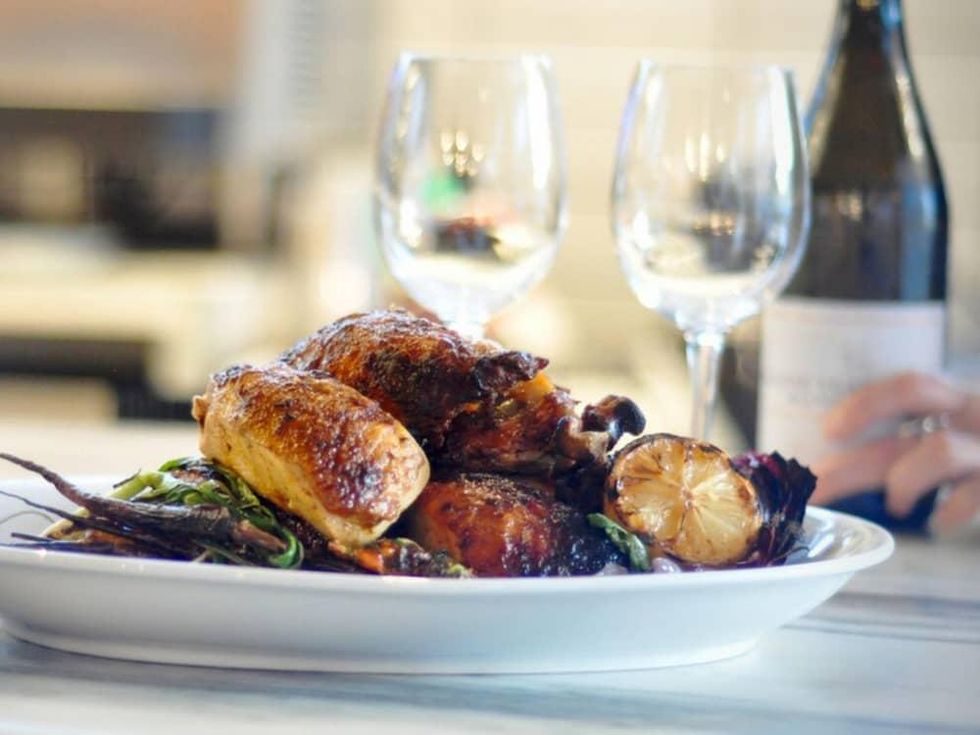 Cantine Italian Cafe and Bar Austin restaurant chicken for two dinner wine dish