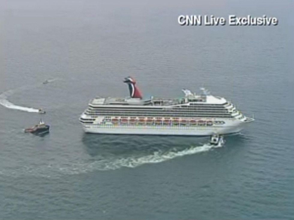 Carnival Triumph, being towed to Mobile