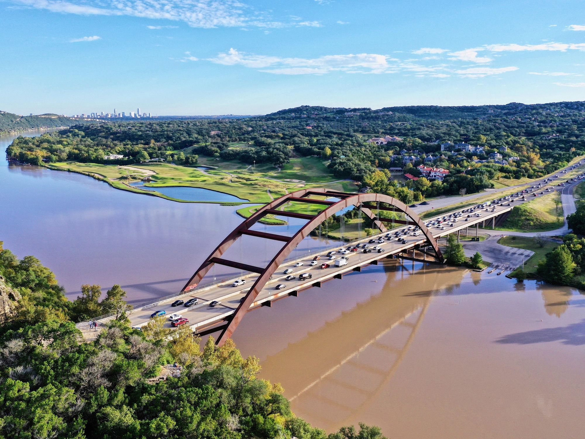 Cars on Austin bridge