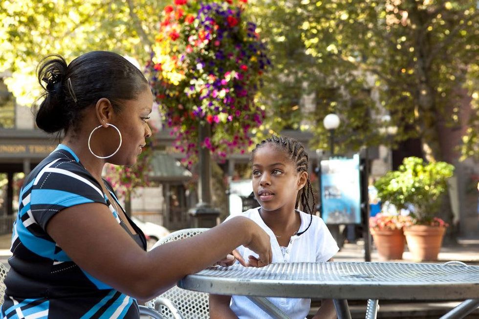 CASA employee with child