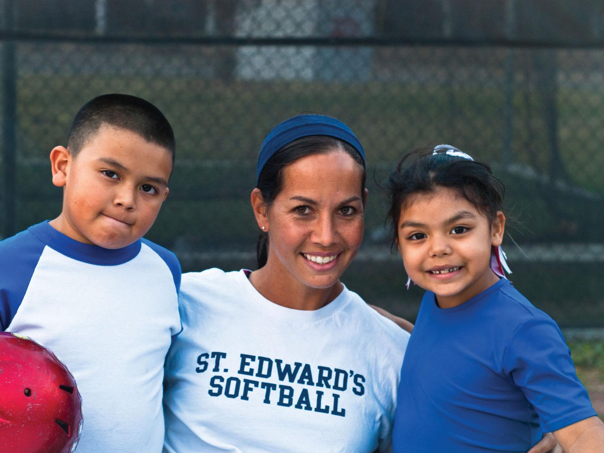 Cat Osterman with kids from RBI nonprofit