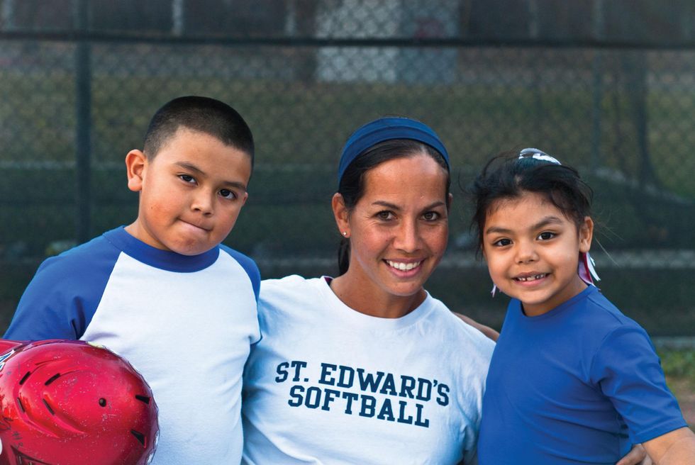 Cat Osterman with kids from RBI nonprofit