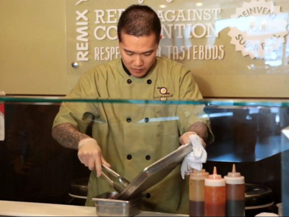 Chef Peter Yung of How Do You Roll creating insect sushi roll