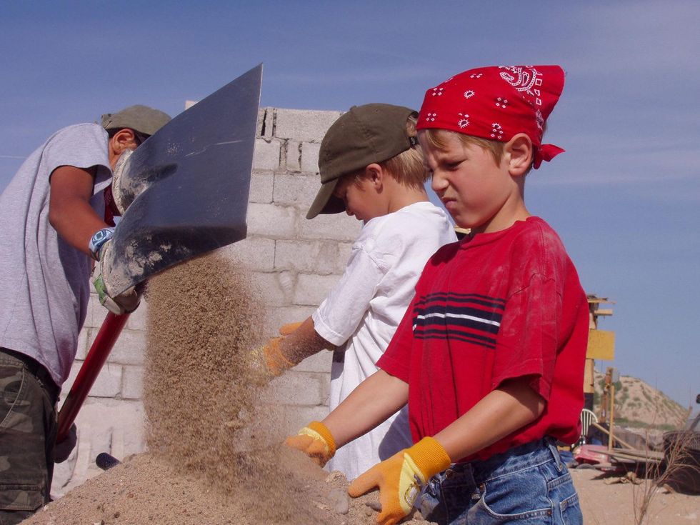 Child volunteering in third-world country
