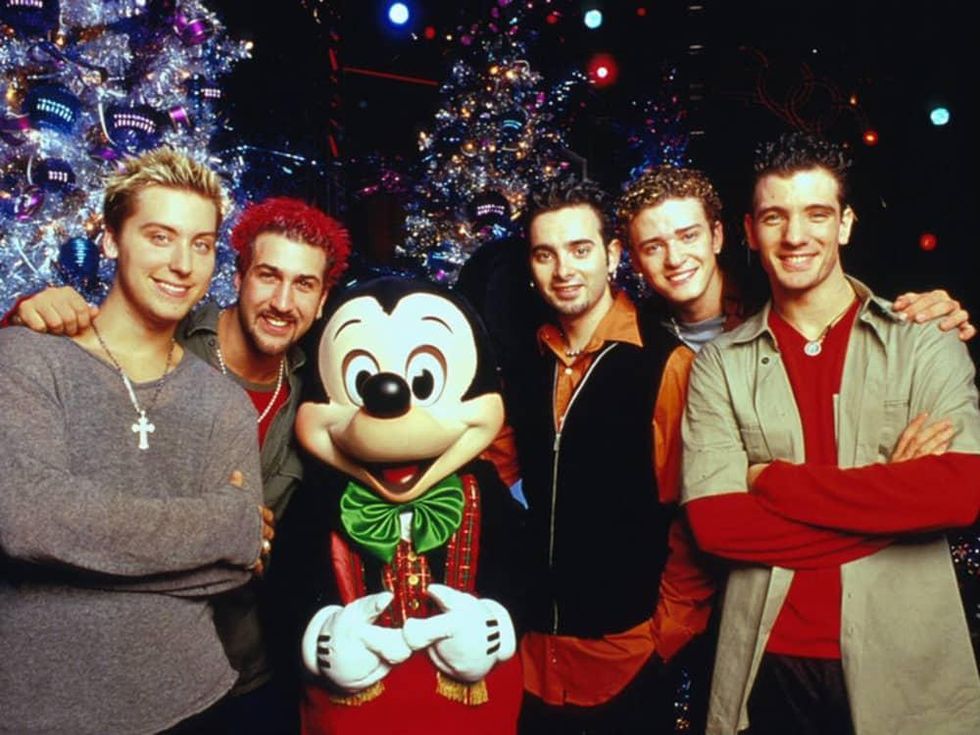 Christmas photo of N Sync with Mickey Mouse for Action Pack Xmas Pops sing along cropped