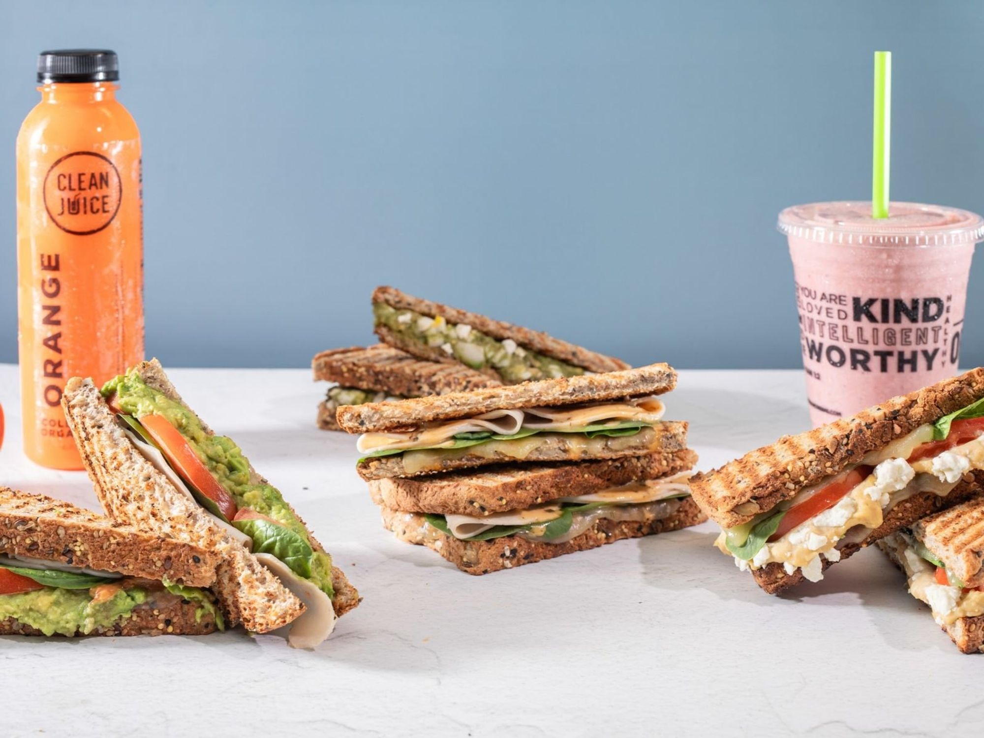 Clean Juice with smoothie and sandwiches