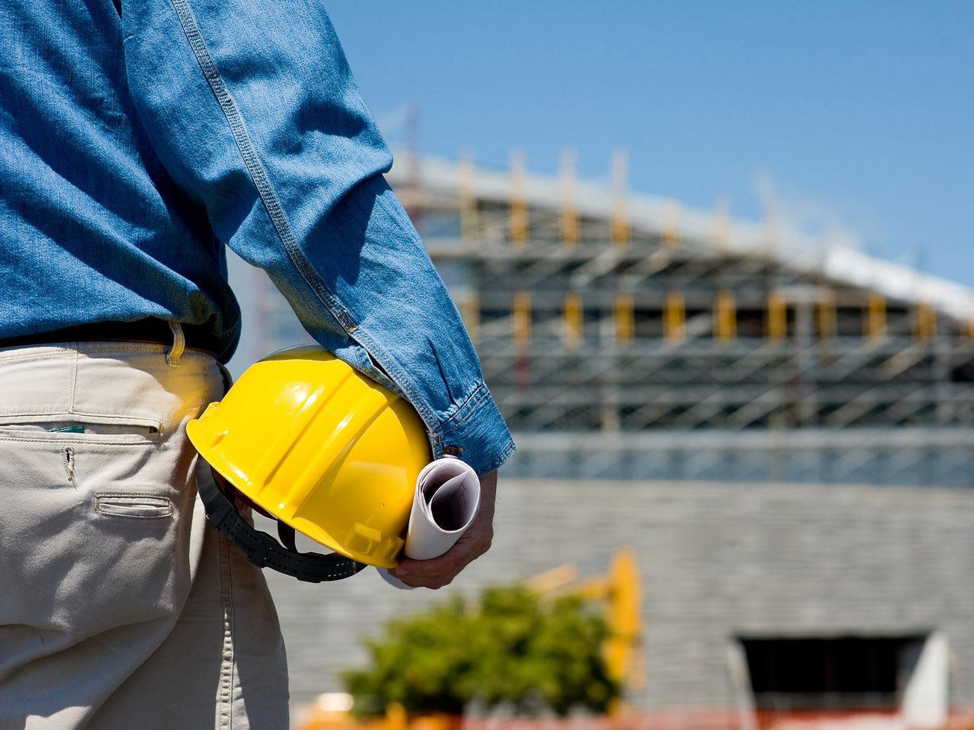 construction worker at construction site with hard hat