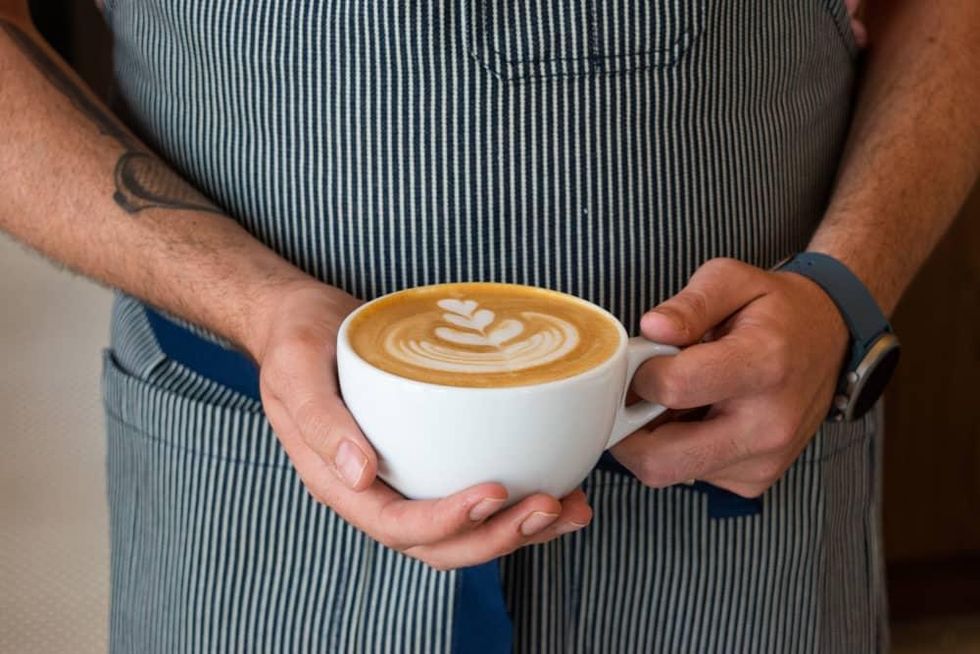 Craftwork Coffee Latte in Hand