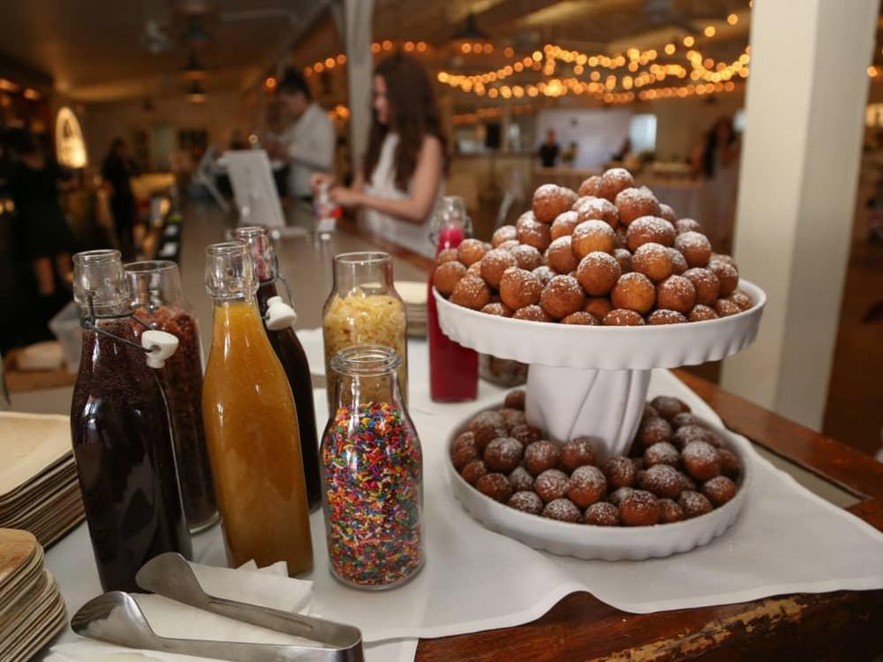 CultureMap Social: The Art Edition at Palm Door donut holes decorating station Pink Avocado Catering